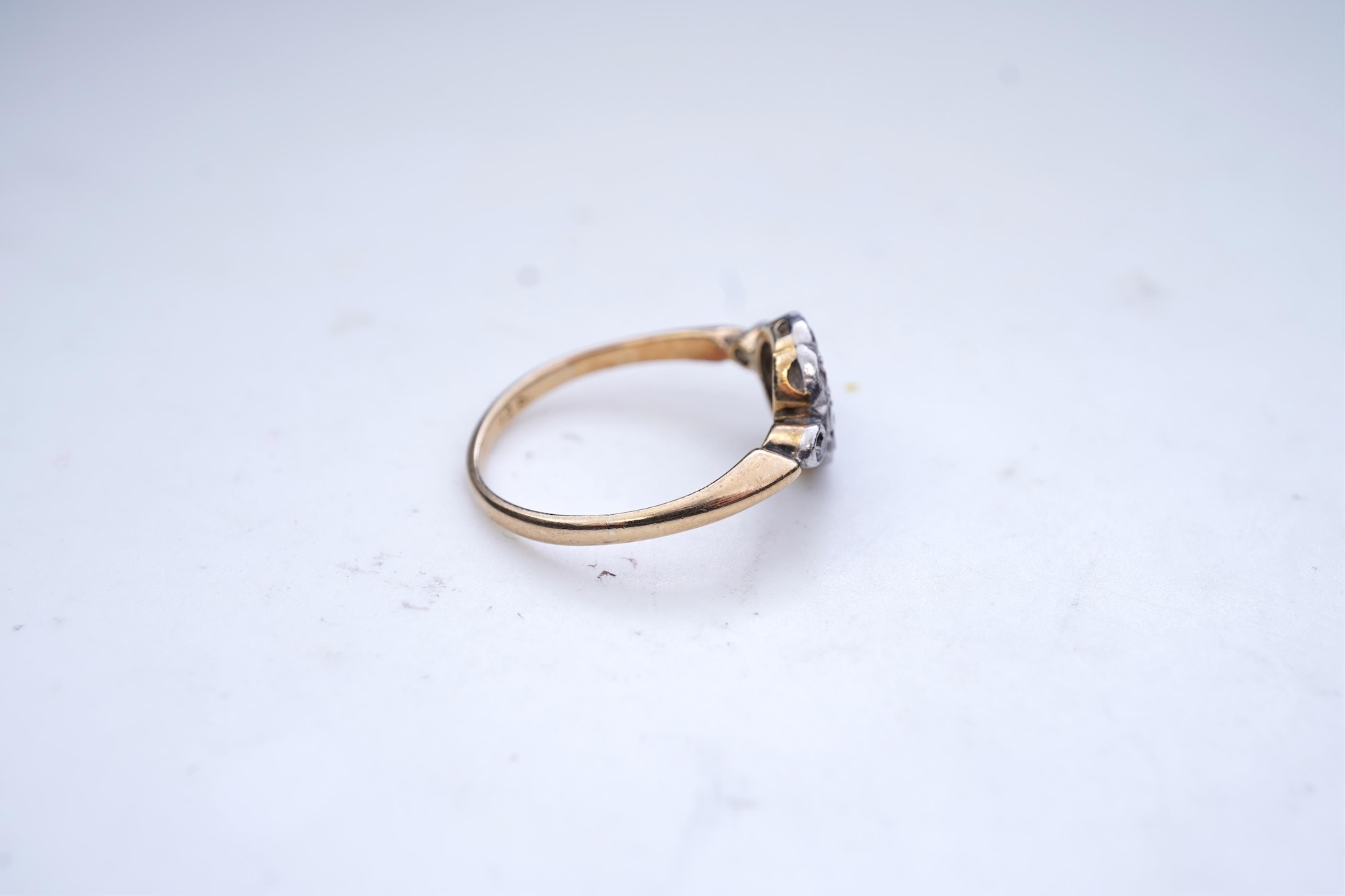 A diamond cluster ring, early 20th century